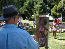 Portrait artist Christopher Newhard painting a model by Anglea Young